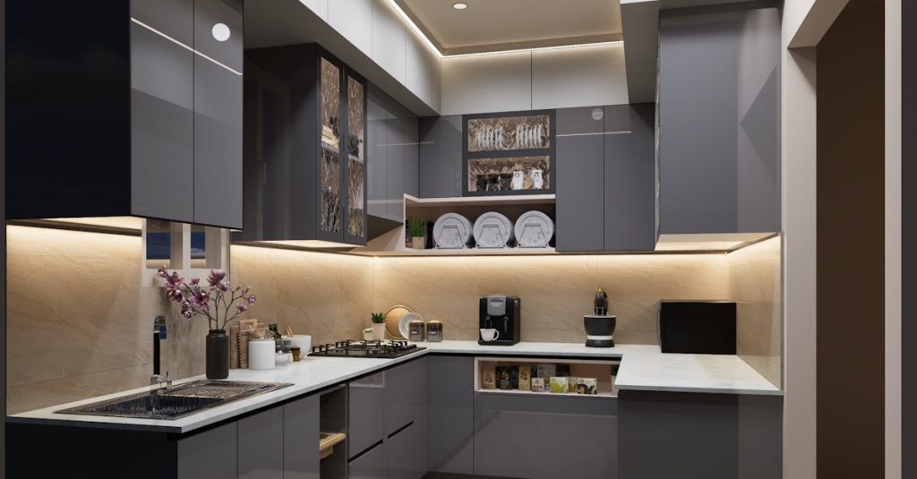 Stylish modern kitchen featuring sleek gray cabinets and under-cabinet lighting.
