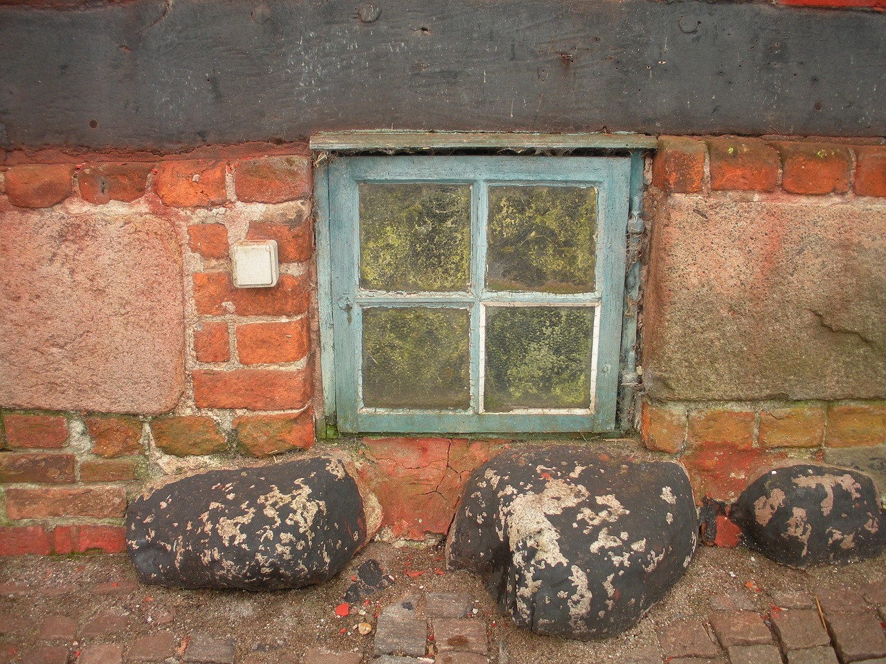old merchant's house, detail, basement window, blue, worn, algae, window, abandoned, dirty, red brick, timber, white stone, black tar, special, heritage, tourism, brown window, basement window, algae, algae, algae, algae, algae